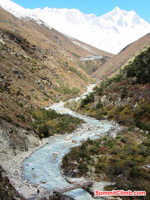 Bridge to Ama Dablam crosses the Dudh Khosi river, with Everest, Lhotse, and Nuptse in the background. Mark van 't Hof Photo