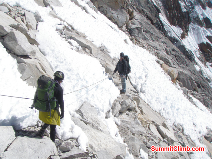 Start of fix line after camp 1. Ang Dorjee Sherpa helping member. Photo Kunnar Karu