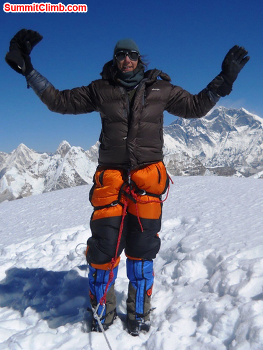 Jennifer Klich, from Tampa, Florida, on the summit of Mera Peak. Everest, Lhotse, Nuptse, and Pumori behind. Photo by Lhakpa Garmu Sherpa.