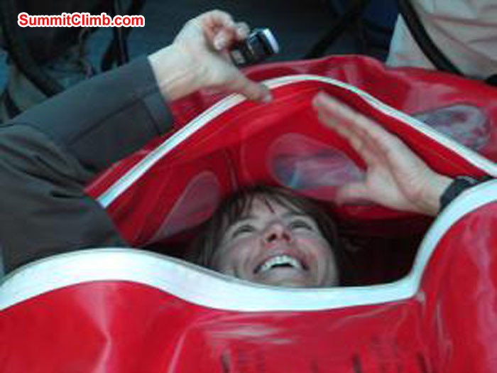Deb “testing” out the gamow bag for the group. It was a little claustrophobic!Photo John Martersteck. 