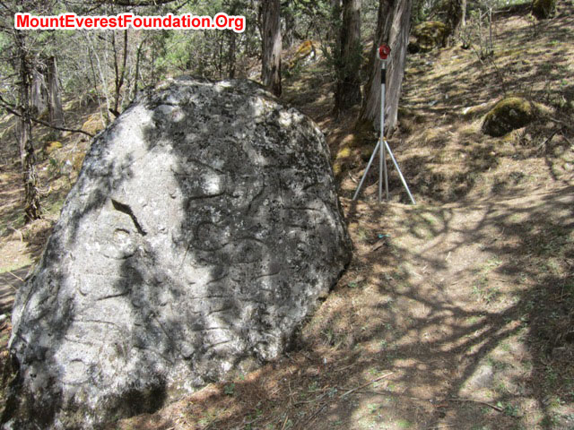 Recording a prayer boulder