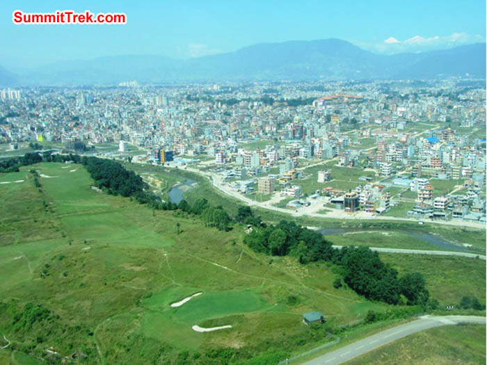Aerial view of golf course and city upon takeoff from KTM airport. Photo Mark van 't Hof