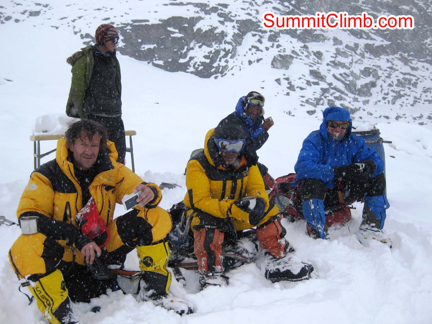 Sherpas and climbers at crampon point after descending North Col from Summit - Photo mia Graeffe