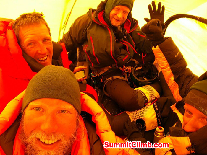 Team members inside tent after summit