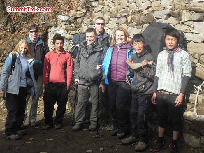 Team members having a photo with our strong porter for the trek. Photo Kaji Tamang
