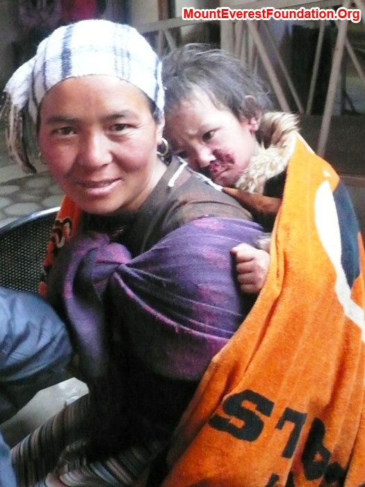 Hamu and Nimke Sherpa after exam, diagnosis and medicine - treatment prescription at Helping Hands Hospital