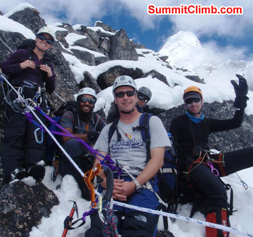 Maggie, Saz, Nathan, Tim, and Mark at the top of the practice rocks above basecamp.Summit of Ama Dablam in background. Photo by James Barritt