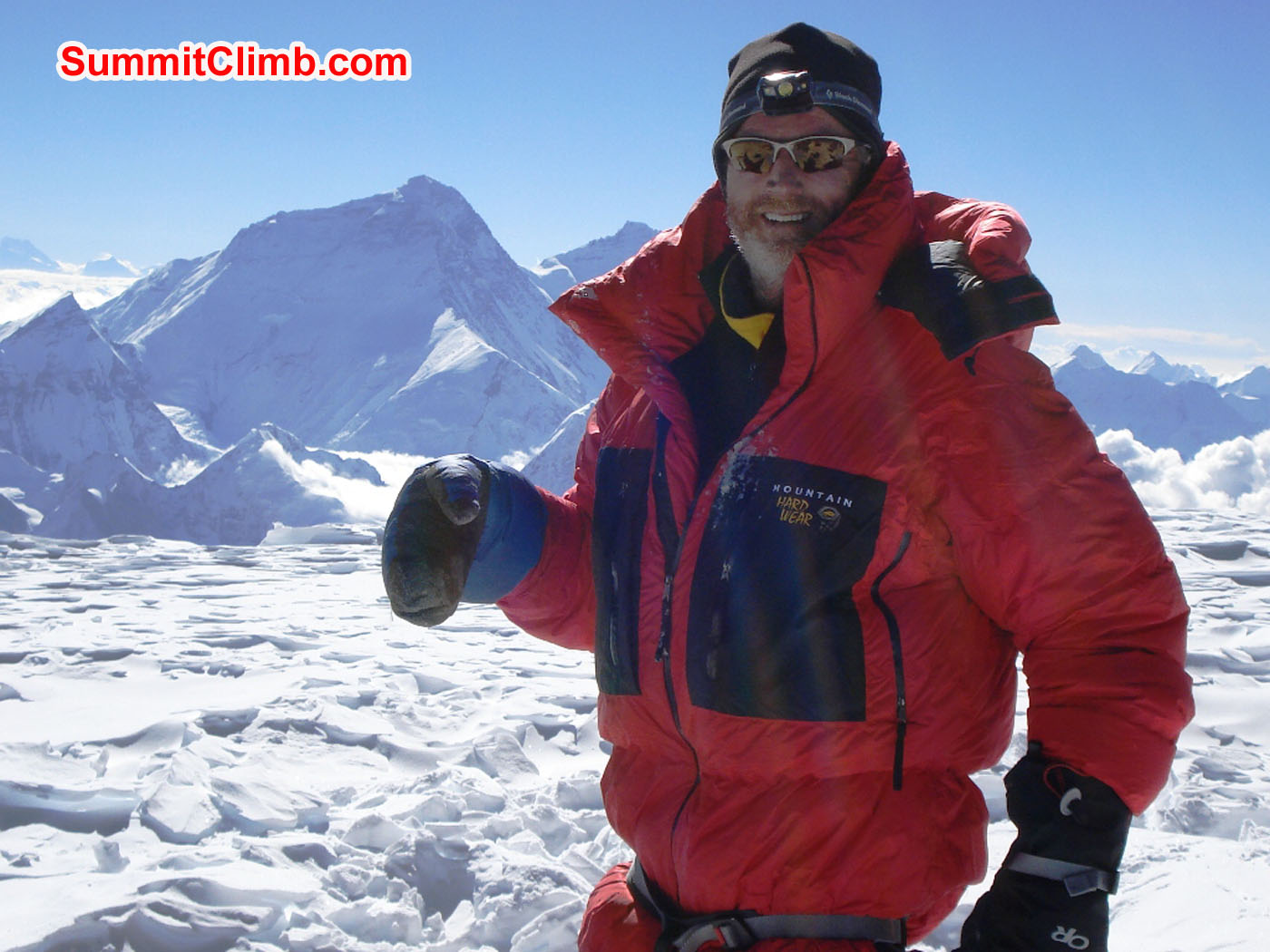 Glenn with view of Everest on summit of Cho Oyu. Jangbu Sherpa Photo