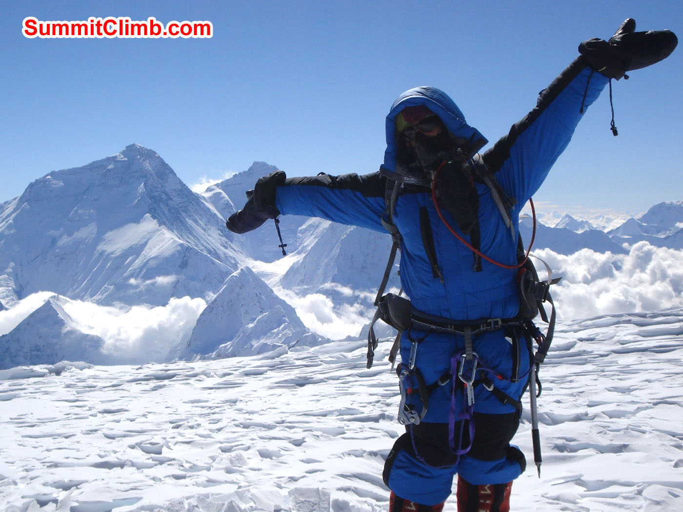 Marina Cortes on the Summit with Everest View. Jangbu Sherpa Photo