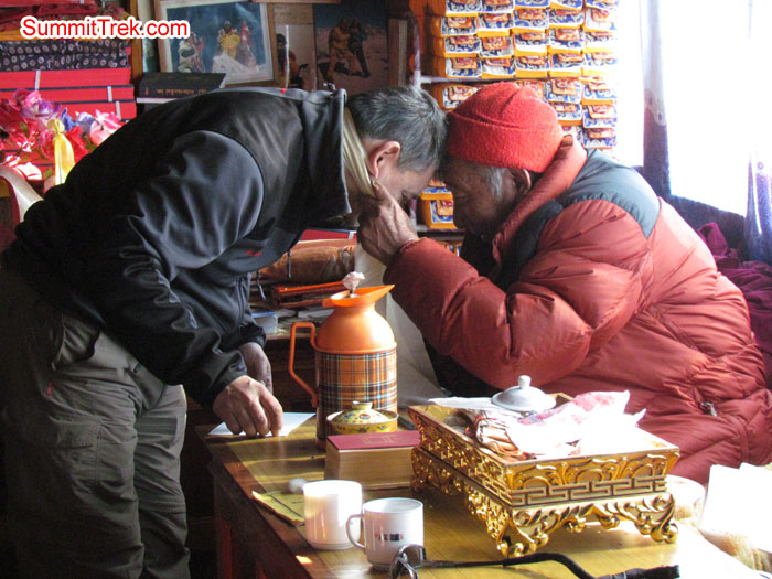 Henri getting bless from Pangboche Lama. Photo Aless