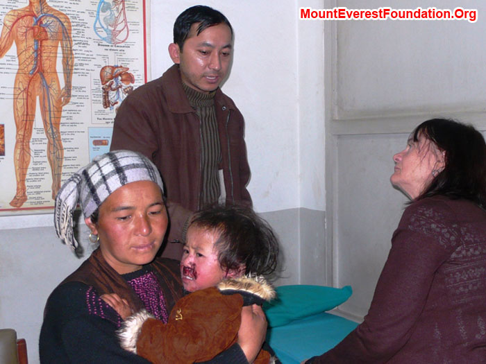 Hamu Sherpa, Nimke Sherpa, Dermatologist Rajendra, and Nurse Practitioner Shelley Bloom at Helping Hands Hospital.